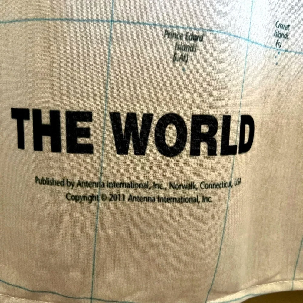 World map tapestry wall hanging with clips. Rod not included.